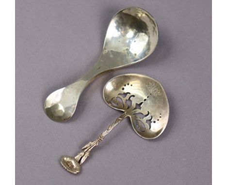 A contemporary Scottish caddy spoon with planished surface, curved handle, &amp; oval bowl, 3⅞” long, Glasgow 1993 by Graham 