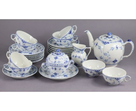 A Royal Copenhagen blue fluted half lace (pattern 525) 27-piece tea service, comprising: a teapot, 6” high, a sugar bowl &amp