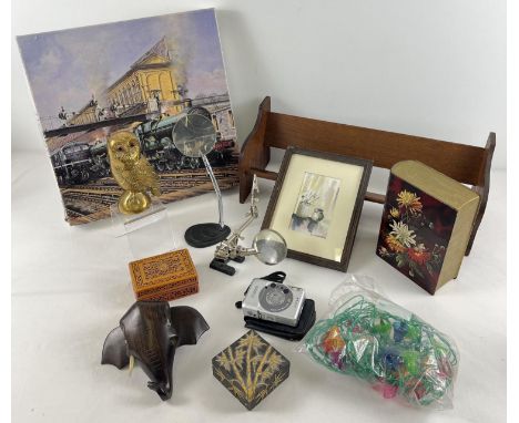 A collection of assorted vintage items to include watch makers magnifying glasses, brass owl paperweight, wooden book stand, 