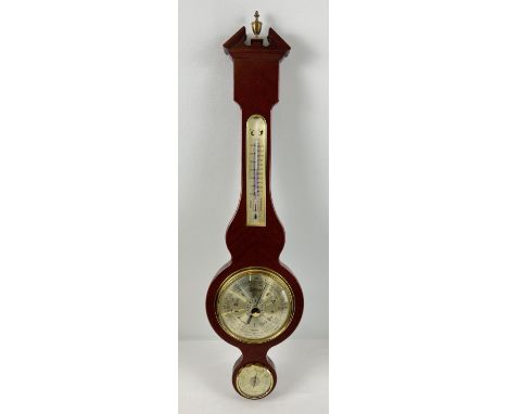 A vintage Metamic dark wood framed barometer and thermometer with brass detail. Approx. 68cm tall. 