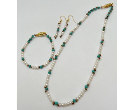 A Chinese turquoise, freshwater pearl and gold bead necklace with matching bracelet &amp; earrings. A 17" beaded necklace wit
