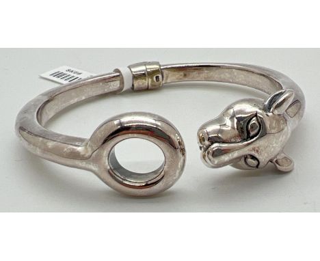 A 925 silver spring hinged bangle by The Jewellery Channel with leopard head finial. Complete with original tag and pouch. Ha