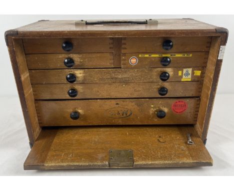 A vintage wooden M &amp; W (Moore &amp; Wright) engineers 7 drawer tool chest. Bakelite handles to all drawers with green bai