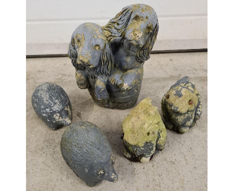 5 vintage concrete garden ornaments of animals. 2 rabbits, 2 hedgehogs and a figure of 2 dogs in a barrel. Largest approx. 28