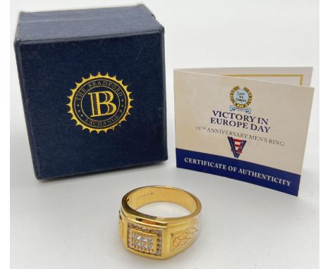 A boxed 75th Anniversary of Victory In Europe Day mens silver gilt ring by Bradford Exchange. 24ct gold plated with rhodium a