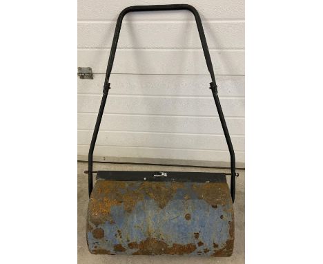 A metal hand held manual garden roller, painted blue. Length of roller approx. 57cm. 