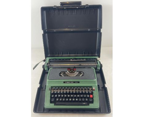 A vintage greem Silver-Reed 500 typewriter complete with carry case. 