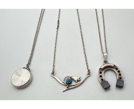 3 vintage silver pendant necklaces. A 925 silver horseshoe pendant set with onyx squares, stamped to bale, on a 14" 925 silve