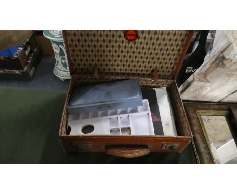 A Vintage Leather Case Containing Paints, Palettes, Sketch Books and Other Artist Materials 