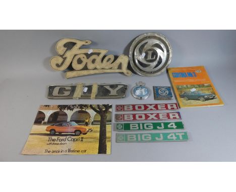 A Tray Containing Vintage Car Badges, Ford, British Leyland and Guy Together with a Ford Capri Brochure and Cortina Mk2 Hayne