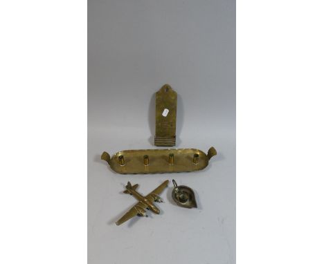 A Collection of Three Pieces of Brass Trench Art Together with a Miniature Candle Stick 