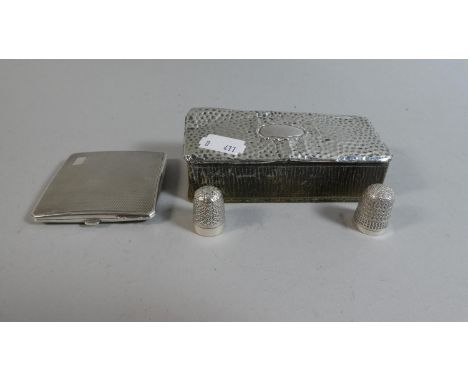 A Silver Topped Rectangular Box, Silver Engine Turned Powder Compact and Two Thimbles Including One Silver Example 