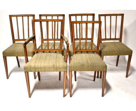 A set of six Edwardian satinwood inlaid stick back dining chairs with stuffover seats and tapering front supports (5+1). COND