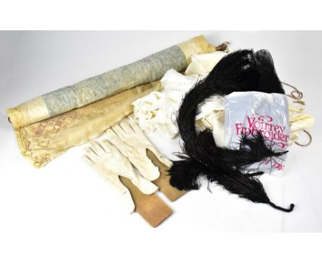 A collection of vintage clothing and textiles to include three 20th century cotton blouses, two pairs of cream kid leather gl