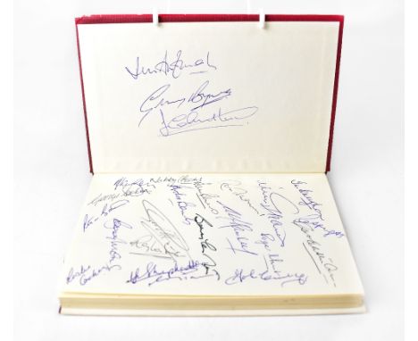 ENGLAND WORLD CUP WINNERS; 'World Cup '66', a single volume bearing multiple signatures of the team and squad involved.We hav