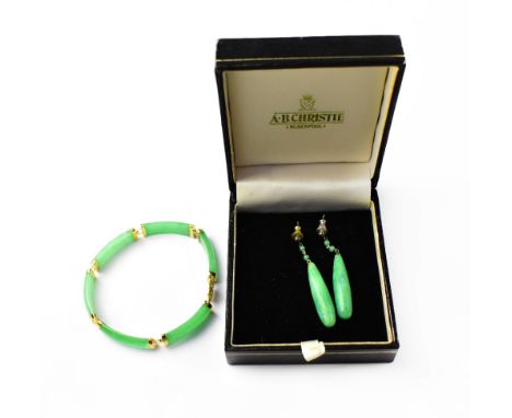 A Chinese jade panelled bracelet with 14ct gold mounts and clasp, length approx 18cm, and a pair of jade drop earrings. CONDI