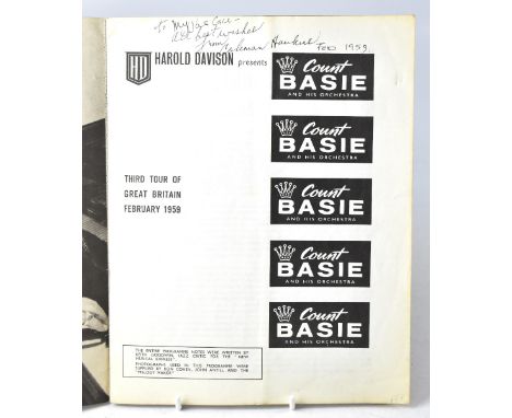 COUNT BASIE & HIS ORCHESTRA; a programme bearing several signatures of Count Basie and the band.We have not authenticated the