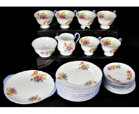 SHELLEY; a part tea service of Queen Anne form, comprising milk jug, sugar bowl, twelve side plates, two cake plates, seven s