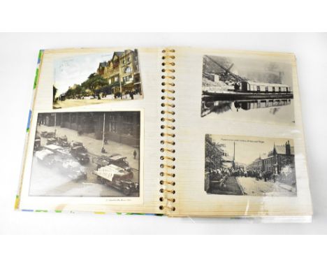 A Fred Astaire autographed postcard within an album containing a small quantity of postcards, including a Humphrey Bogart pho