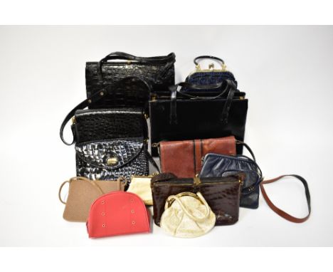 Various circa 1940s and later vintage bags to include a brown crocodile handbag with yellow metal clasp, a circa 1950s faux c