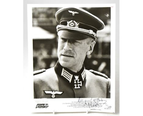 MAX VON SYDOW; a promotional black and white photograph from the film 'Escape to Victory' bearing the star's signature, 25.5 