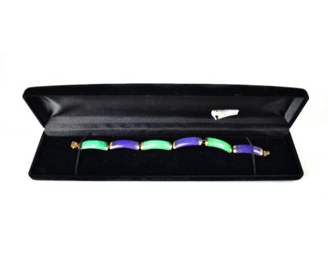 A 14ct yellow gold and purple and green jade rectangular panel bracelet.