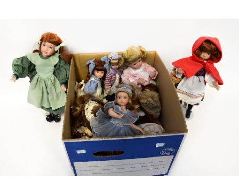 Thirteen collectible dolls from various companies, some limited edition, to include a Leonardo doll on wooden rocking horse, 