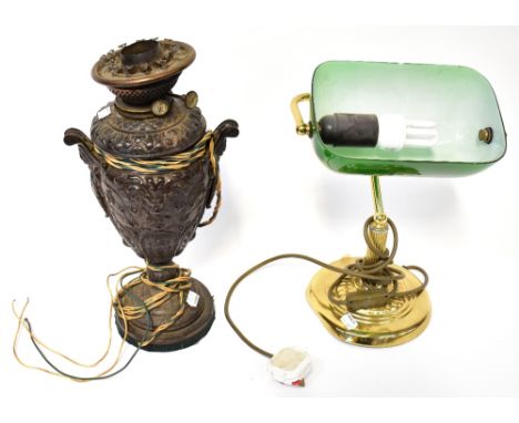 An early 20th century metal Wright and Butler of Birmingham Premier Duplex oil lamp in the Classical urn shape style to stepp