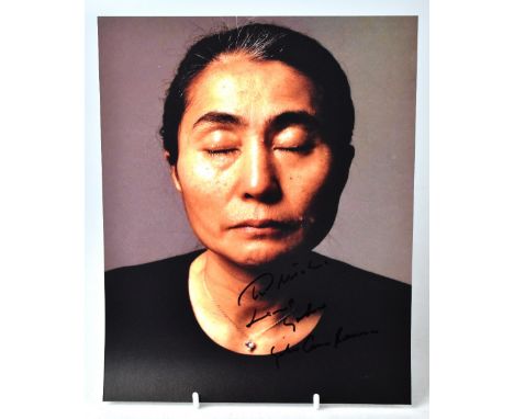YOKO ONO; a photograph of the star bearing signature, 25 x 20cm.We have not authenticated these signatures, please satisfy yo