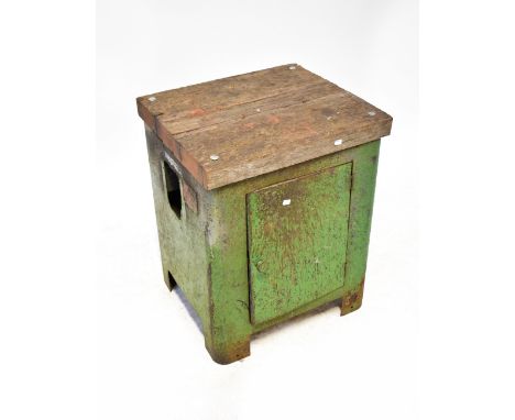 A vintage distressed green metal painted workshop cabinet, with a later applied butcher's block, 77 x 63 x 55cm.