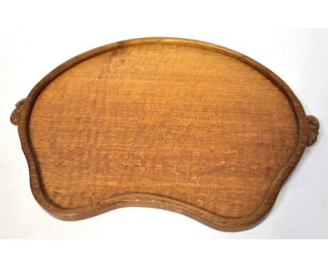 ROBERT 'MOUSEMAN' THOMPSON (KILBURN); an oak tea tray of kidney shape, with two carved mouse handles either side, length from