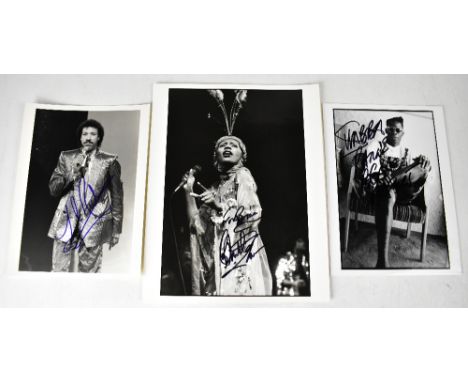 Three black and white photographs bearing signatures, Lionel Richie, Shabba Ranks and Liz Mitchell of Boney M (3).We have not