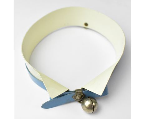 An unusual quaint vintage early 20th century celluloid dog collar, designed to represent a shirt collar, pale blue bowtie and