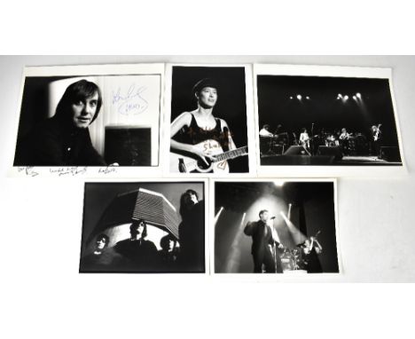 Two black and white photographs bearing signatures, Michelle Shocked and Mud, also three unsigned black and white photographs