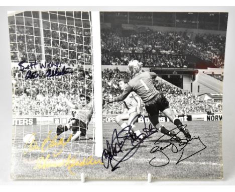 FOOTBALL; a black and white promotional photograph bearing four signatures, including goal keeper Gary Bailey and Howard Kend