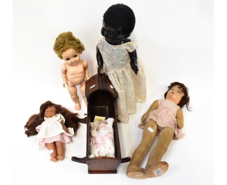 Four vintage dolls comprising a circa 1960s Pedigree Mama baby doll, with jointed limbs and open and shut eyes, open mouth wi