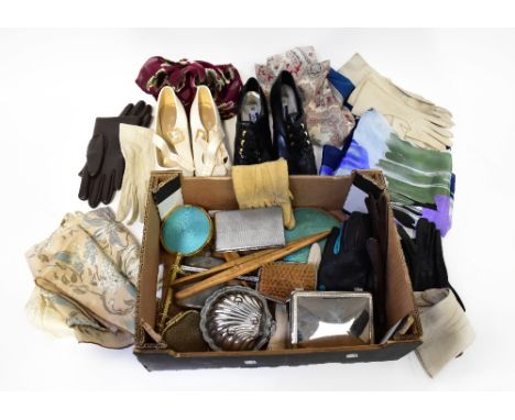 A quantity of vintage gloves to include circa 1940s and 1950s leather gloves, cream yellow and black examples, a pair of Edwa