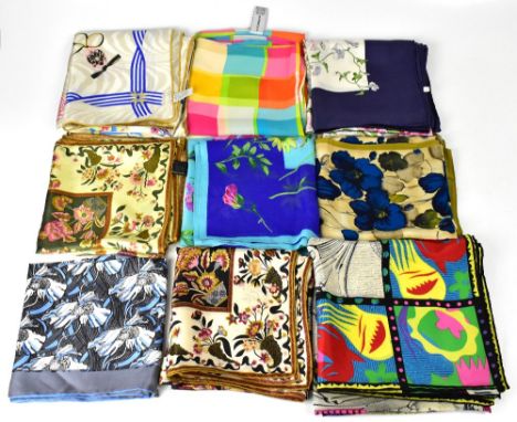 A group of ten vintage silk scarves to include a Pierre Cardin example of navy ground with al-over floral design within a nav