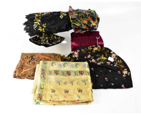 A quantity of Victorian and later textiles to include Victorian black silk fringed scarf, a 20th century silk and wool pashmi