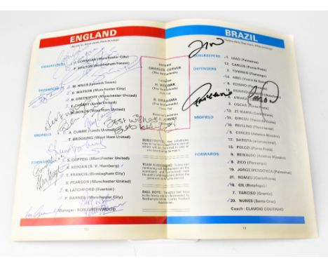 ENGLAND FOOTBALL; a programme from England v Brazil 19th April 1978, at Wembley Stadium, bearing several signatures to the ce