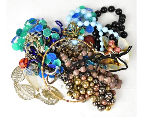 A quantity of costume jewellery to include an enamel articulated fish necklace, etc.