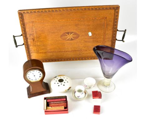 An Edwardian mahogany balloon-shaped mantel clock, the painted dial set with Roman numerals, together with a 1930s crossbande