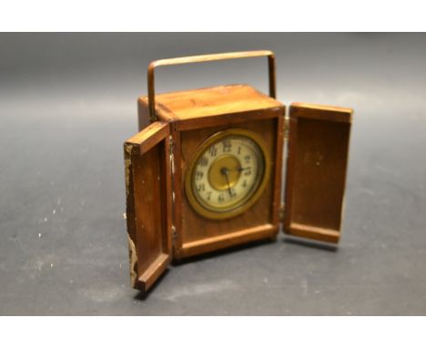 A mahogany cased travelling clock