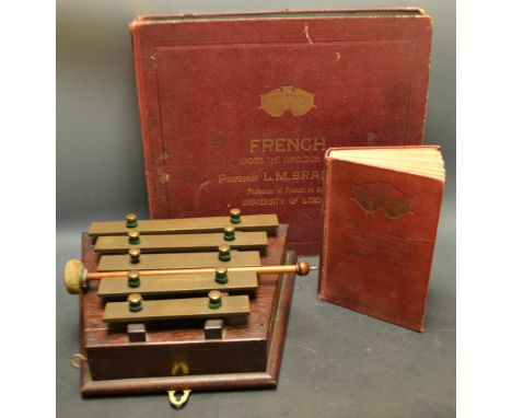 Music- a vintage 5 bar xylophone with baton, a cased French language set, etc