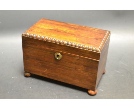 A George IV rosewood tea caddy, c.1830
