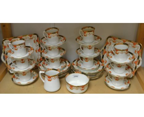 A Sutherland China tea service for twelve decorated with flowers in the Imari pallet, printed marks