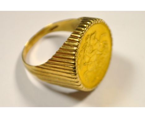 A gold sovereign, dated 1918, 9ct gold mounted as a ring, 16.3g