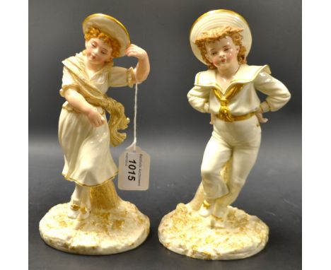 A pair of Royal Worcester figural spill vases, Sailor Boy and Sailor Girl, in flesh tones, picked out in gilt, both standing 