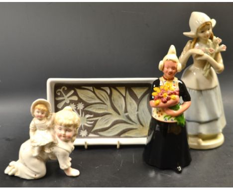 Ceramics - a Victorian continental porcelain figure children at play; a Dutch girl figure flask; etc (4)