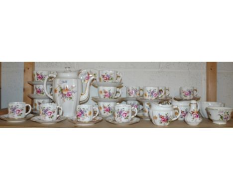 A Royal Crown Derby Posie coffee and tea service, including coffee pot, twelve coffee cups and saucers, six tea cups and sauc